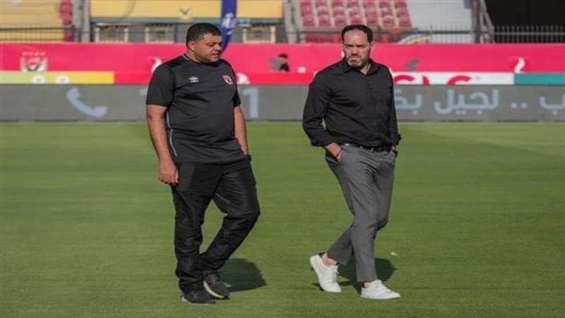 محمد مدني وسوراريش مدرب الأهلي السابق