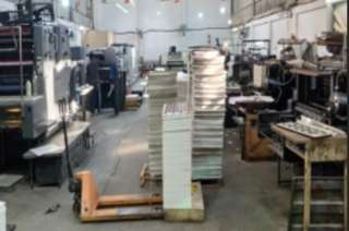 ضبط مطبعة غير مرخصة بالقاهرة لنسخ كتب دراسية مقلدة دون تصريح